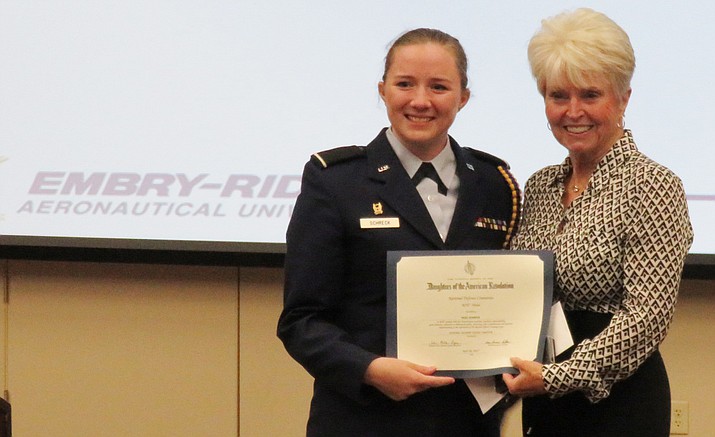 ROTC Cadet Heidi Schreck, left, and Regent Sharon Johnson of the General George Crook Chapter, Daughters of the American Revolution
