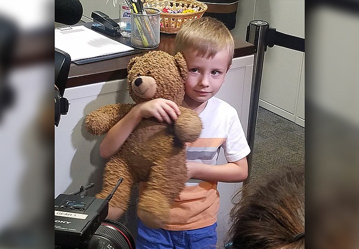 Luke Swofford, 4, was reunited with his beloved teddy bear after losing him in Dallas' Love Field airport. (Photo courtesy of Dallas Love Field)