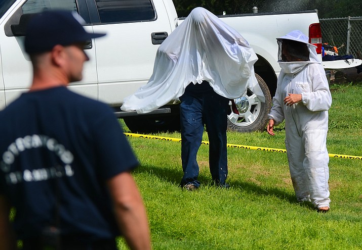 The Cottonwood Fire and Medical Department respond to a reported bee attack Thursday morning at Riverfront Park. (VVN/Vyto Starinskas)