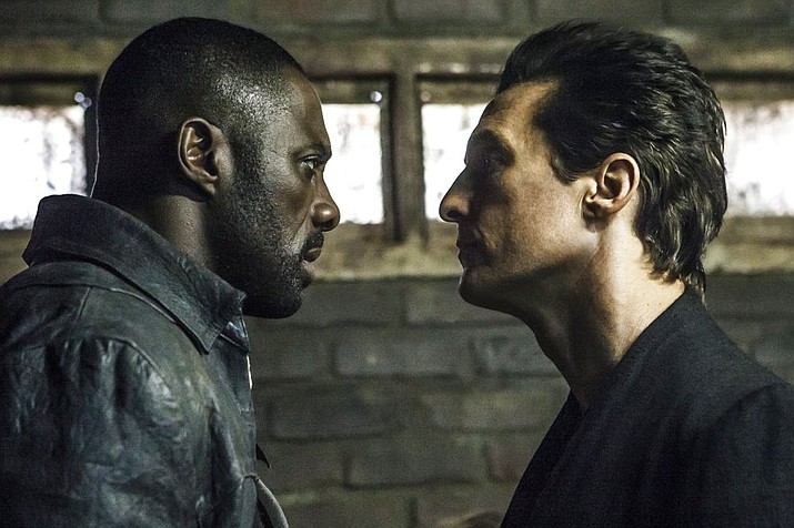 This image released by Sony Pictures shows Idris Elba, left, and Matthew McConaughey in the Columbia Pictures film, The Dark Tower." (Ilze Kitshoff/Columbia Pictures/Sony via AP)