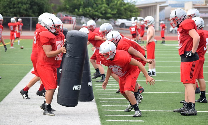 Mingus Union football players practice tackling on Wednesday afternoon at practice at home. The Marauders began official practices for the fall season on Monday. (VVN/James Kelley)