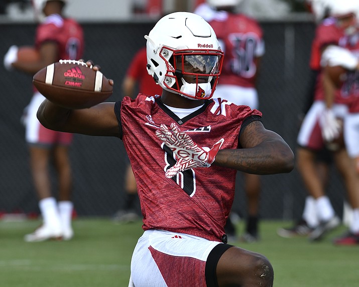 University of Louisville quarterback Lamar Jackson warms up before the first open NCAA college football practice of the season, Monday, July. 31, 2017, in Louisville, Ky. (Timothy D. Easley/AP)