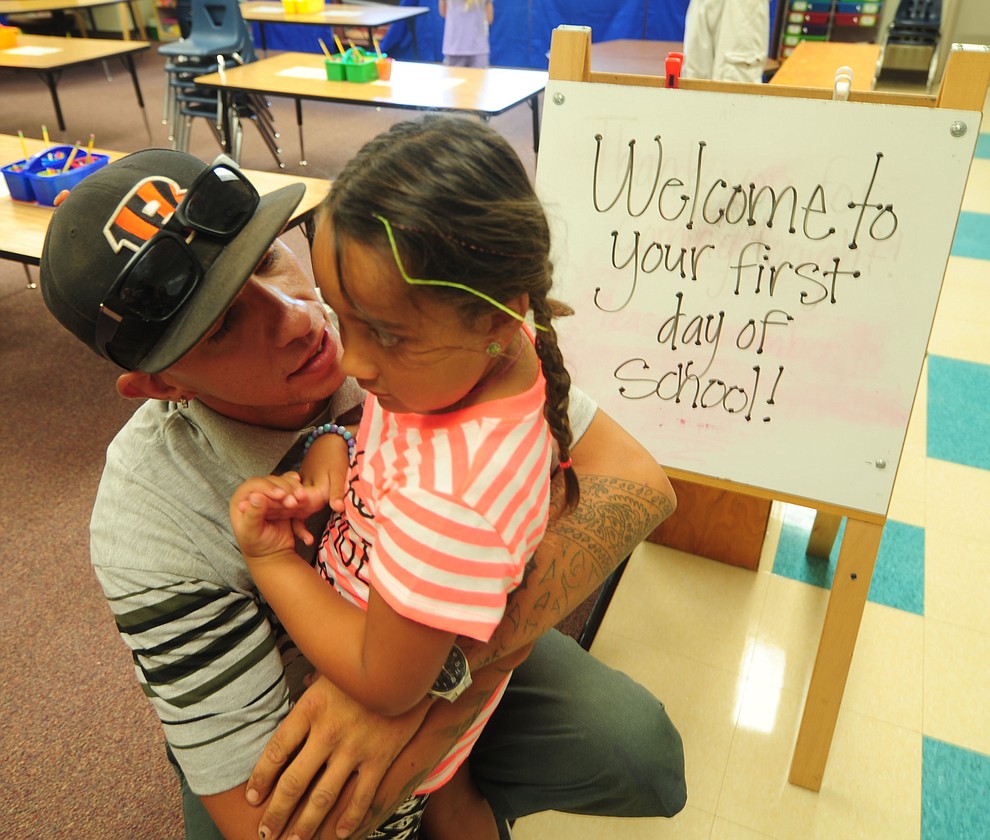 Peter Alaniz says goodbye to his daughter Khloe in kindergarten at Territorial Elementary School in Chino Valley Tuesday, August 8. (Les Stukenberg/The Daily Courier).