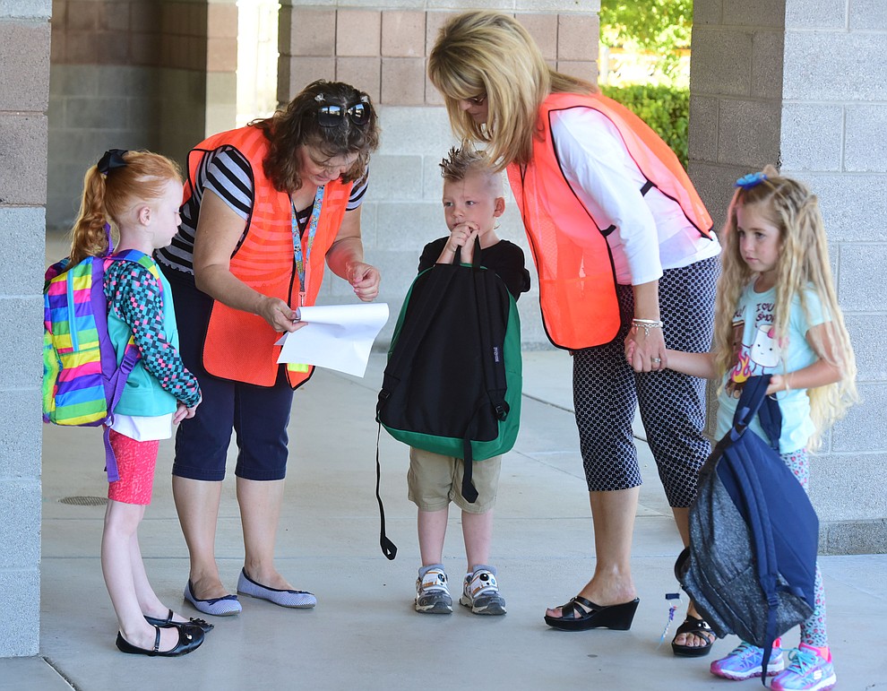 School staff help students find their way on the first day of school at Territorial Elementary School in Chino Valley Tuesday, August 8. (Les Stukenberg/The Daily Courier).
