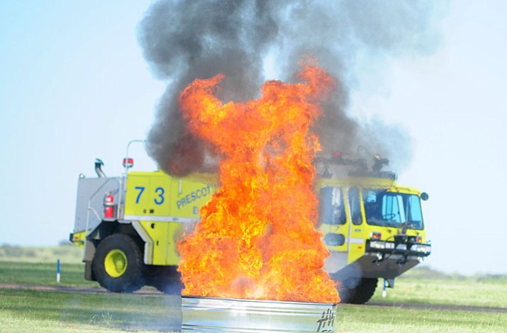 Prescott Fire Department’s Aircraft Rescue Fire Fighting Vehicle responds to a reported aircraft crash as the Prescott Airport held a mass casualty drill Thursday morning. (Les Stukenberg/The Daily Courier)
