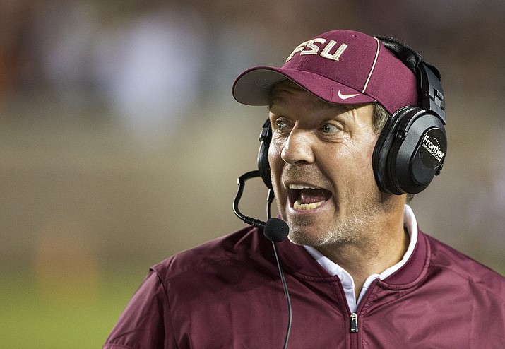 In this Oct. 29, 2016, file photo, Florida State coach Jimbo Fisher shouts instructions against Clemson in Tallahassee, Fla. (Mark Wallheiser/AP, File)