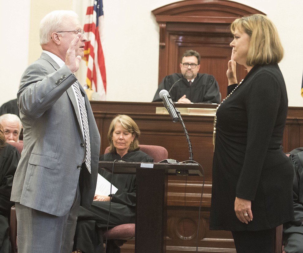 Arizona Supreme Court Justice Robert Brutinel administers the oath of office during the Investiture of Jennifer Campbell to the Arizona Court of Appeals Division One at the Yavapai County Courthouse in Prescott Friday, August 11.(Les Stukenberg/The Daily Courier).
