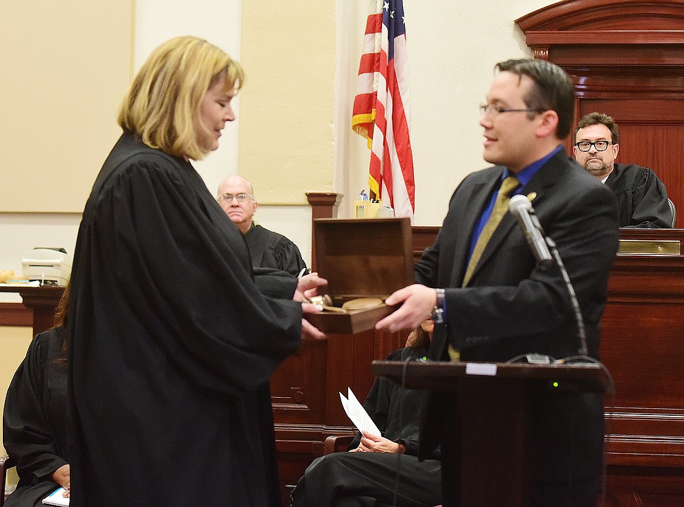 Brian Furuya, Vice President Board of Governors State Bar of Arizona presents a gavel during the Investiture of Jennifer Campbell to the Arizona Court of Appeals Division One at the Yavapai County Courthouse in Prescott Friday, August 11.(Les Stukenberg/The Daily Courier).