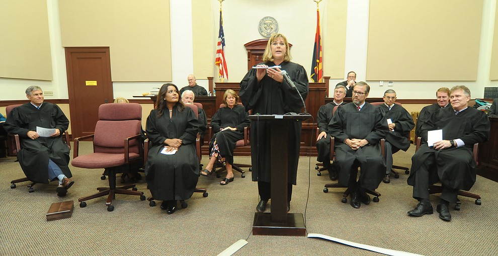Justice Jennifer Campbell shows her pad of names to thank during her Investiture to the Arizona Court of Appeals Division One at the Yavapai County Courthouse in Prescott Friday, August 11.(Les Stukenberg/The Daily Courier).