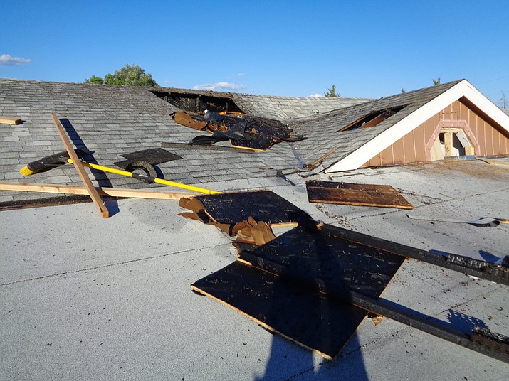 Damage to the roof of a Paulden home.