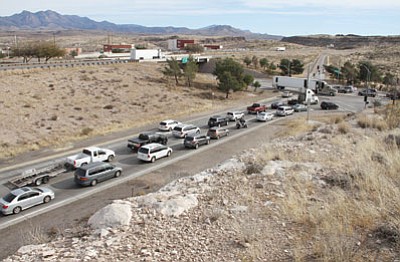 Traffic along the junction of I-40 (foreground and background) and U.S. 93 (on right) on a Friday afternoon. The proposed Interstate 11 would include a stretch of both roadways.