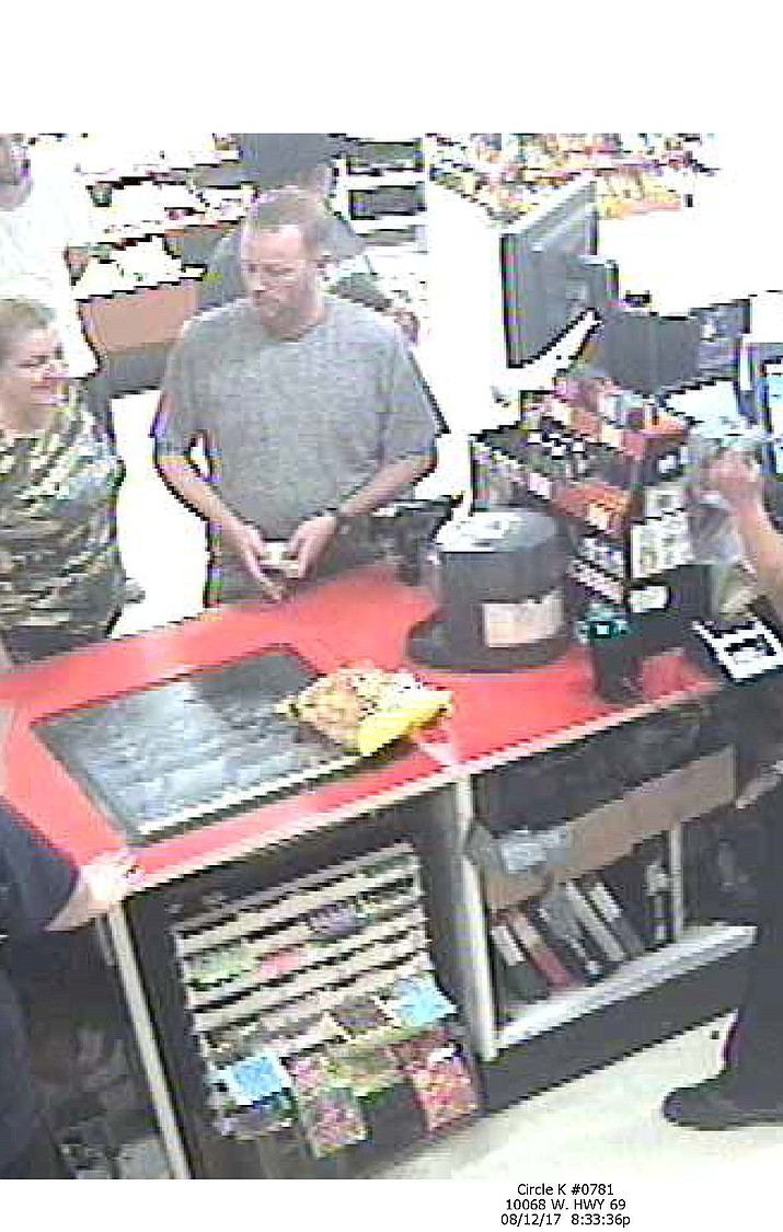 These two people are suspected of passing a counterfeit $100 bill at the Circle K in Mayer.