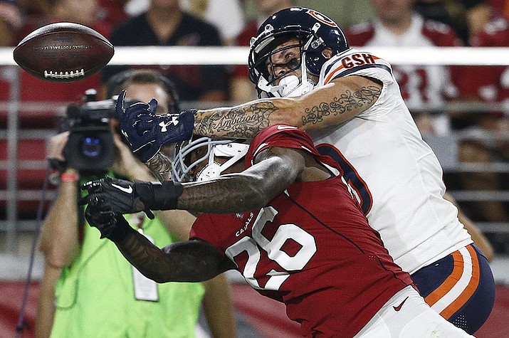 Arizona Cardinals cornerback Brandon Williams (26) breaks up a pass intended for Chicago Bears wide receiver Tanner Gentry (19) Saturday, Aug. 19, 2017, in Glendale. (Ross D. Franklin/AP)