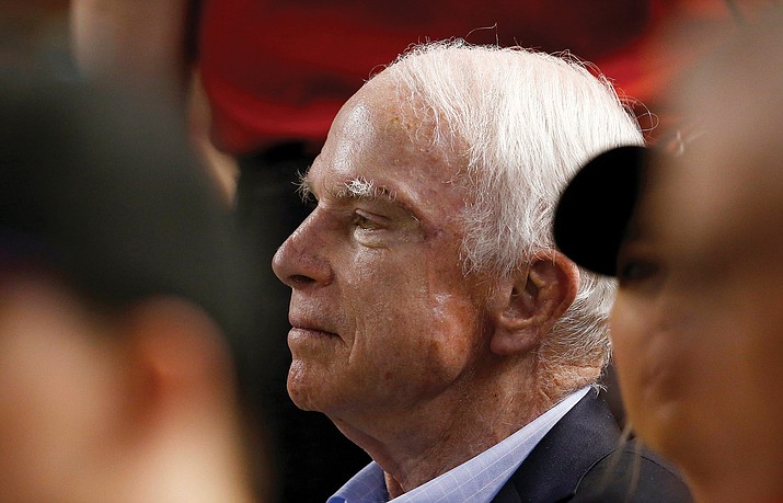 In this Aug 10, file photo, Sen. John McCain, R-Ariz., watches a baseball game between the Arizona Diamondbacks and the Los Angeles Dodgers during the first inning in Phoenix. (Ross D. Franklin/AP, file)