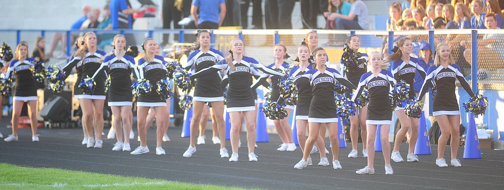 Prescott's cheerleaders open the festivities as the Badgers take on the Marcos de Niza in Prescott Friday, August 25. (Les Stukenberg/The Daily Courier).