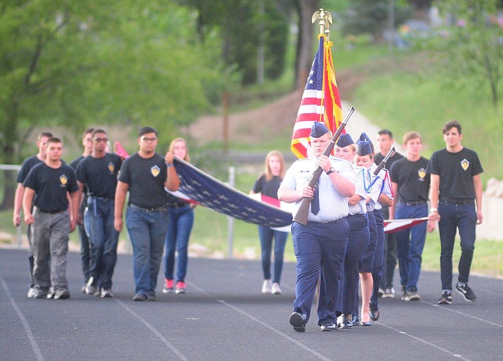 Prescott's JROTC presents the colors as the Badgers take on the Marcos de Niza in Prescott Friday, August 25. (Les Stukenberg/The Daily Courier).