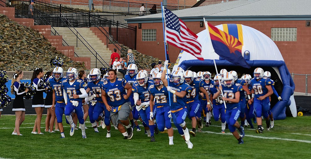 Prescott's football team takes the field as the Badgers take on the Marcos de Niza in Prescott Friday, August 25. (Les Stukenberg/The Daily Courier).