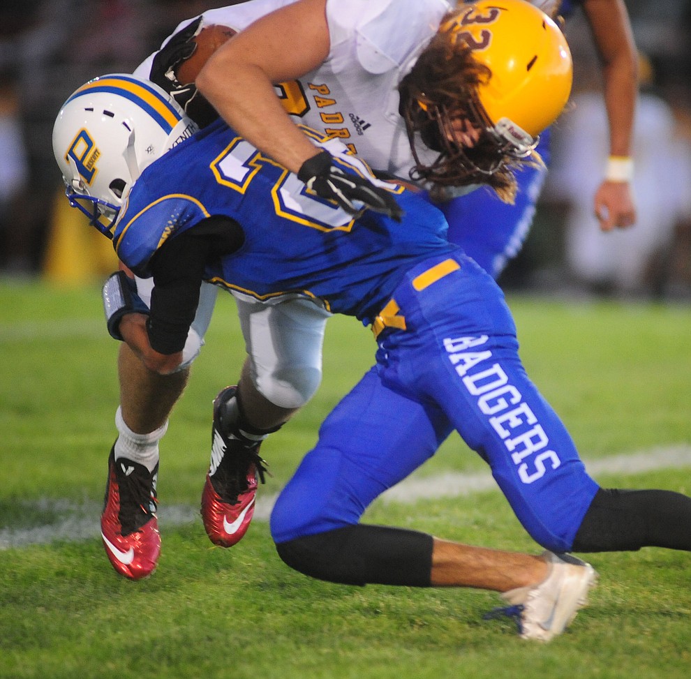 Prescott's Sam Giordan makes a tackle as the Badgers take on the Marcos de Niza in Prescott Friday, August 25. (Les Stukenberg/The Daily Courier).
