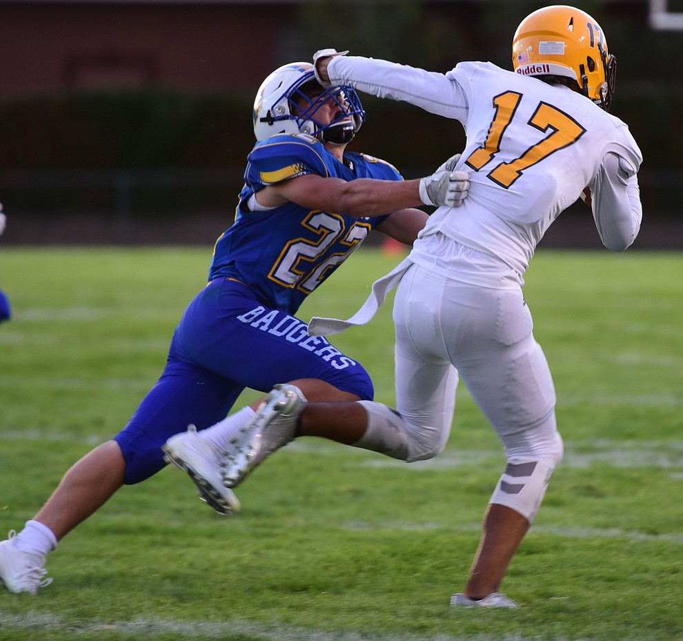 Prescott's Colton Amos makes a tackle as the Badgers take on the Marcos de Niza in Prescott Friday, August 25. (Les Stukenberg/The Daily Courier).
