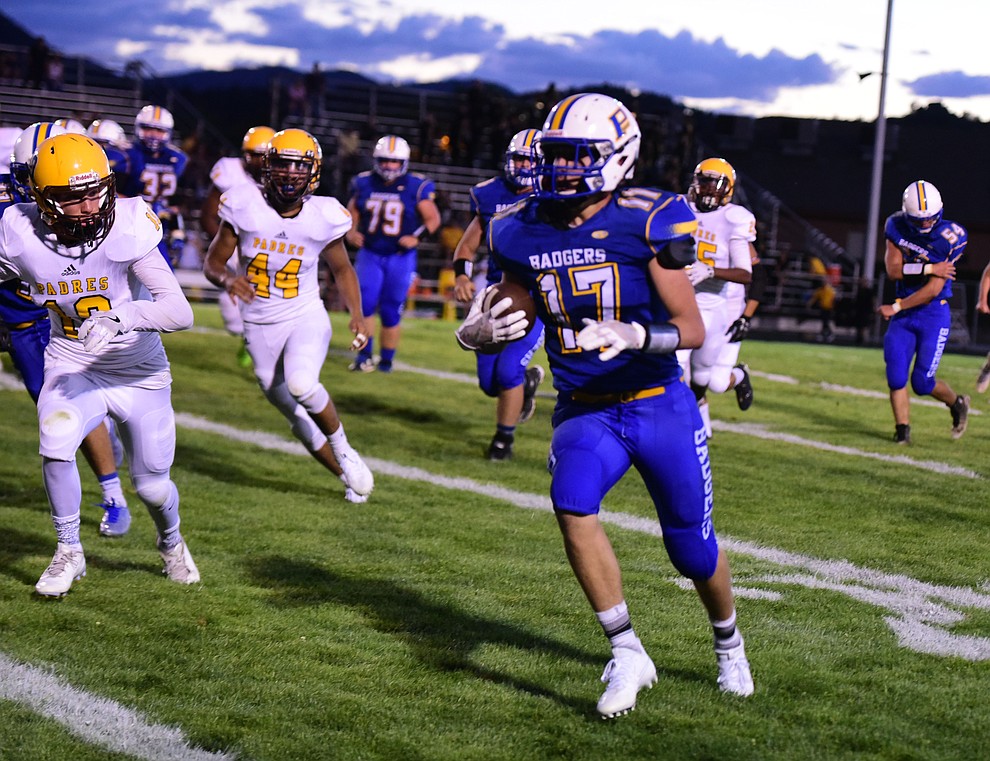 Prescott's Ryan Greene breaks free for a long run as the Badgers take on the Marcos de Niza in Prescott Friday, August 25. (Les Stukenberg/The Daily Courier).