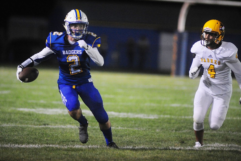 Prescott's John Chaffeur break free after a catch as the Badgers take on the Marcos de Niza in Prescott Friday, August 25. (Les Stukenberg/The Daily Courier).