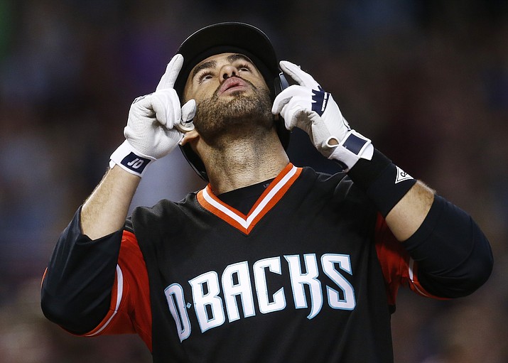 Arizona Diamondbacks’ J.D. Martinez gestures after hitting a home run against the San Francisco Giants during the sixth inning of a baseball game Sunday, Aug. 27, in Phoenix. (Ross D. Franklin/AP)