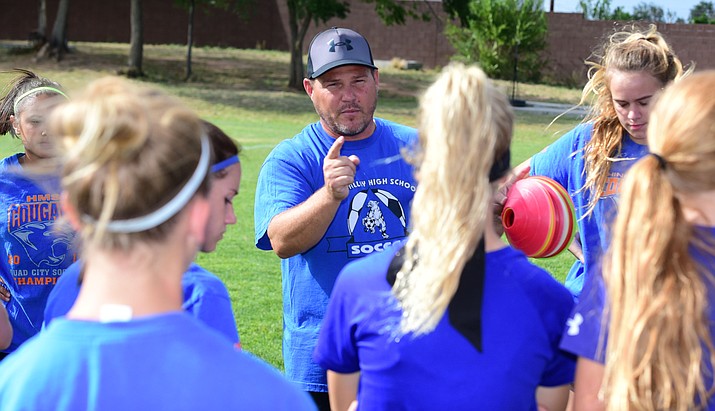 Chino Valley girls soccer coach Alan Foster lines out a drill during practice Monday afternoon in Chino Valley. (Les Stukenberg/Courier)
