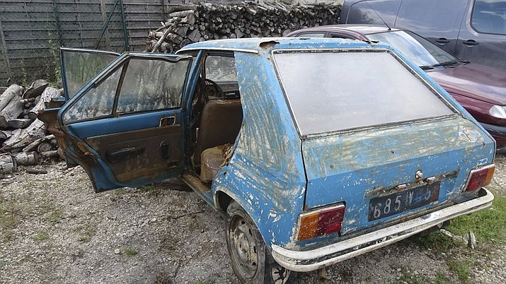 A blue Peugeot 104 stolen in the heart of France’s Champagne country in 1979 is being reunited with its owner - 38 years later - after French police pulled it, in surprisingly good shape but teeming with crayfish, from a murky swamp. (AP Photo/Chris den Hond)

