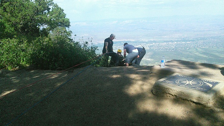 A 50-year-old man piloting a hang glider was in stable condition after being injured and rescued on Mingus Mountain Saturday afternoon, according to Jerome Fire Chief Rusty Blair. (Photo Courtesy of Jerome Fire Department)