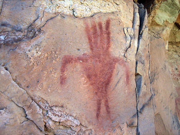 Many of the pictographs at Snake Gulch, like the one pictured above, feature a variety of human figures. 