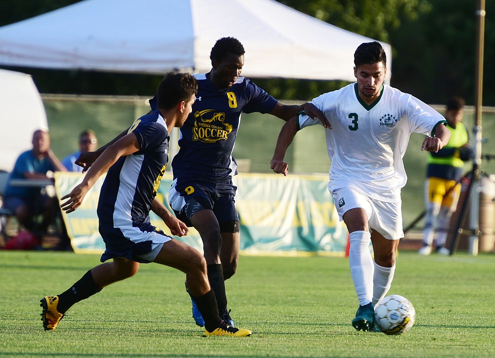 Yavapai's Ziyad Fares brings the ball upfield as the Roughriders take on the Phoenix College Bears Tuesday night at Mountain Valley Park in Prescott Valley. (Les Stukenberg/Courier).