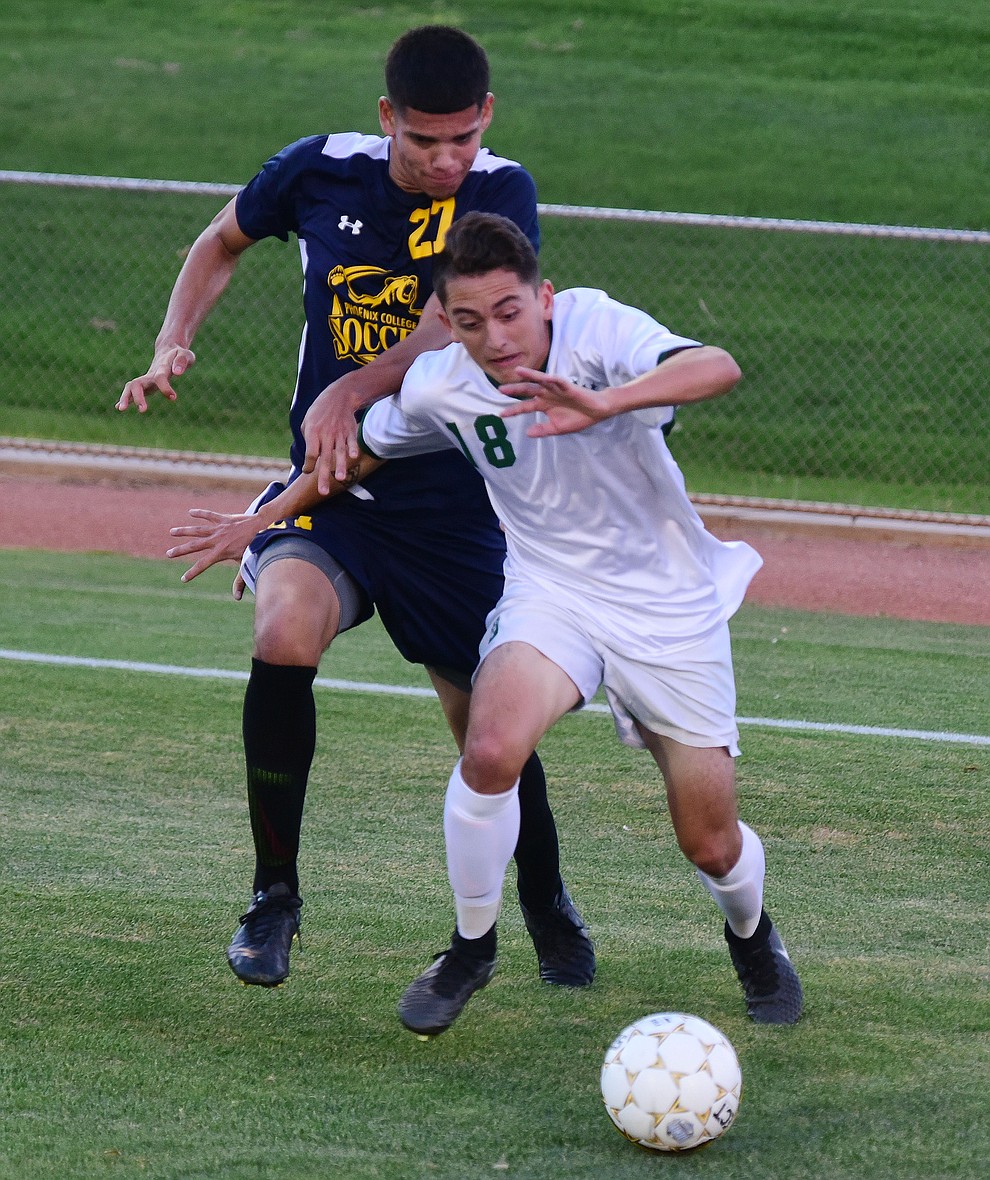 Yavapai's Lorenzo Macias battles on the endline as the Roughriders take on the Phoenix College Bears Tuesday night at Mountain Valley Park in Prescott Valley. (Les Stukenberg/Courier).