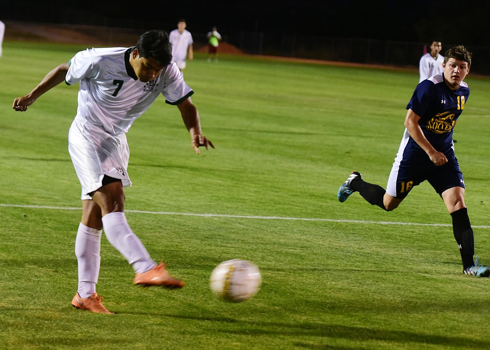 Yavapai's Alexander Guadron scores the lone goal before lighting halted the match as the Roughriders take on the Phoenix College Bears Tuesday night at Mountain Valley Park in Prescott Valley. (Les Stukenberg/Courier).