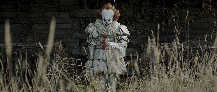 This image released by Warner Bros. Pictures shows Bill Skarsgard in a scene from "It." (Warner Bros. Pictures via AP)