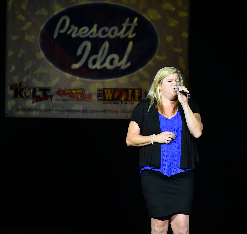 Tiffani Fortney sings amazing Grace as her victory song in the finale of the 8th annual Prescott Idol competition at the Yavapai College Performance Hall Wednesday, September 6 in Prescott . (Les Stukenberg/Courier).