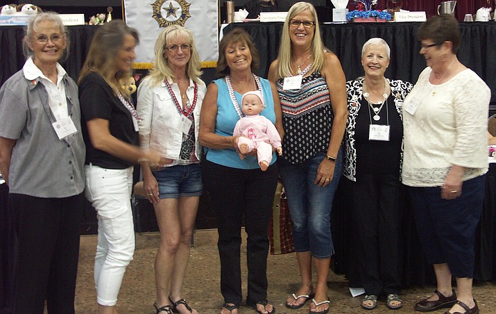 Members of the American Legion Auxiliary unit in Crown King accept Orabelle. (ALA/Courtesy)
