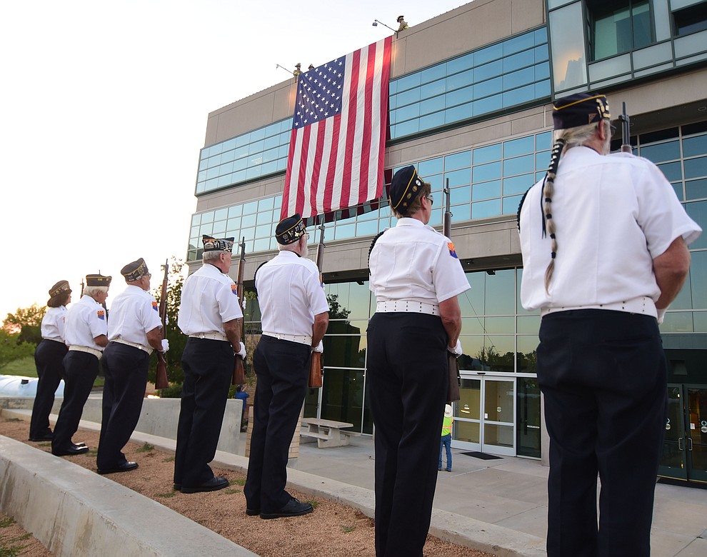 American Legion Post 6 Color Guard as the flag is lowered fro the roof of the Civic Center during the Prescott Valley 2017 9/11 Patriot Day Ceremony at the Civic Center in Prescott Valley. (Les Stukenberg/Courier).