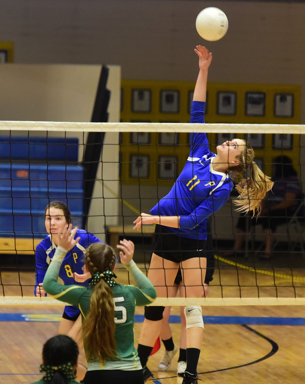 Prescott's Savanna James (11) goes for a kill as they play Mohave in volleyball Tuesday, September 12 in Prescott. (Les Stukenberg/Courier).