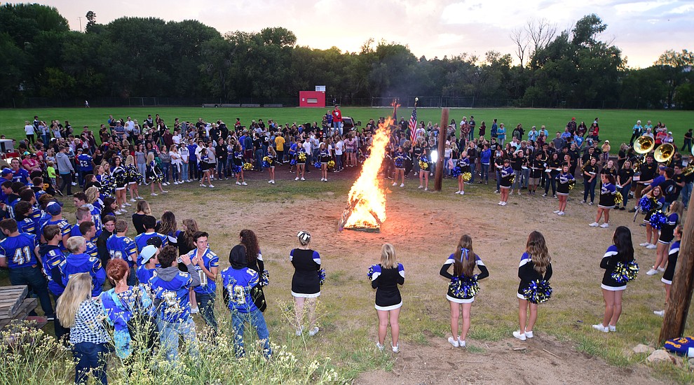 Students gather for the bonfire during the annual Prescott High School Homecoming Parade and Bonfire Wednesday, September 13 at Prescott Mile High Middle School. (Les Stukenberg/Courier).