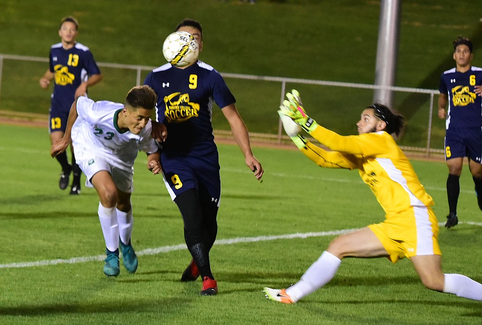 Yavapai's John Scearce tries to head the ball in the final seconds of the second overtime as the Roughriders played to a 1-1 draw against Phoenix College in a makeup game Thursday, September 14 in Prescott Valley. (Les Stukenberg/Courier).