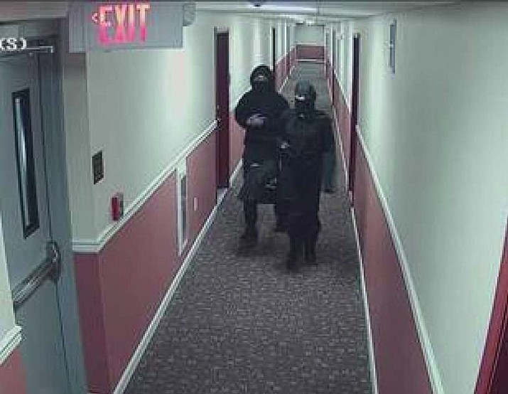 Police say two people dressed as ninjas broke into a New Jersey apartment building and set several fires. Newark police officials say the unidentified man and woman broke in through a second-floor apartment Police say the building’s sprinkler system quickly doused the flames. No one was injured. (Newark Public Safety via AP)

