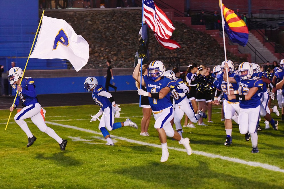 Prescott players take the field as the Badgers play Moon Valley in the 2017 Homecoming game Friday, September 15 in Prescott. (Les Stukenberg/Courier).