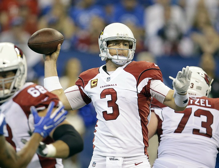 Cardinals quarterback Carson Palmer (3) throws during the first half of an NFL football game against the Indianapolis Colts, Sunday, Sept. 17, in Indianapolis. Palmer rallied his team in the fourth quarter and overtime to help Arizona claim its first victory this year. (AJ Mast/AP)