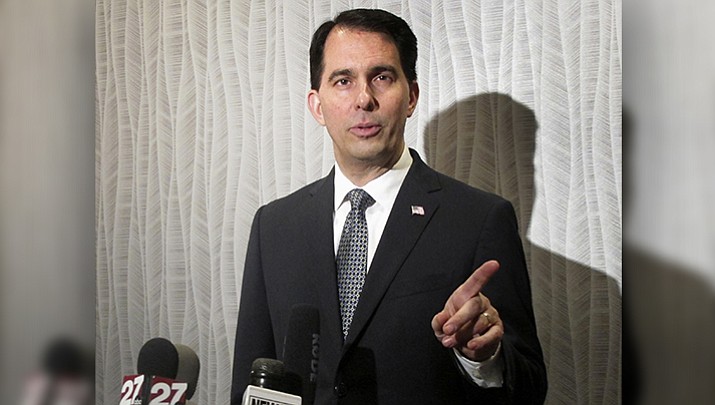 In a March 8, 2017 file photo, Wisconsin Gov. Scott Walker speaks at a news conference in Wis. Republican governors have launched a website that appears to be an independent news outlet. The RGA launched the site this summer, but only identified its connection to the site after the Associated Press. (AP Photo/Scott Bauer, File)

