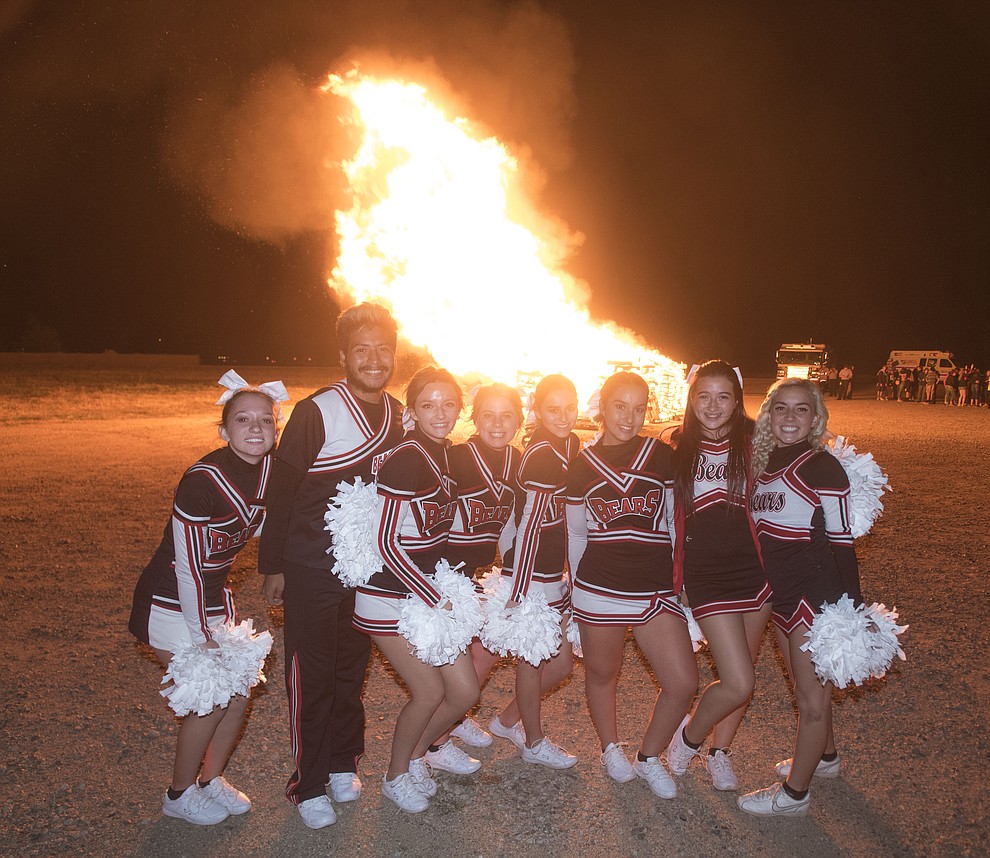 Cheerleaders pose for a photo as Bradshaw Mountain students gather for the annual bonfire as part of Homecoming week at the Prescott Valley School. (Les Stukenberg/Courier).