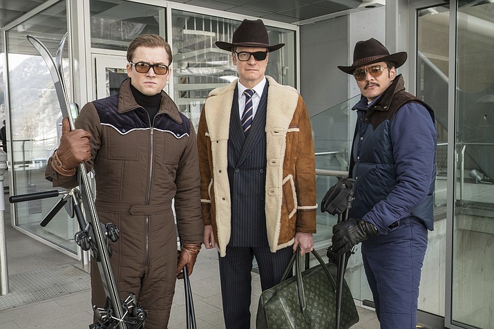 This image released by Twentieth Century Fox shows, from left, Taron Egerton, Colin Firth, and Pedro Pascal in "Kingsman: The Golden Circle." (Giles Keyte/Twentieth Century Fox via AP)