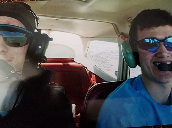 Jeremiah Linnertz (left) and Spencer Kihlstrom during an earlier flight. The two died over the weekend after the plane they were riding in crashed east of Paulden. (Michaela Alanis/Courtesy)
