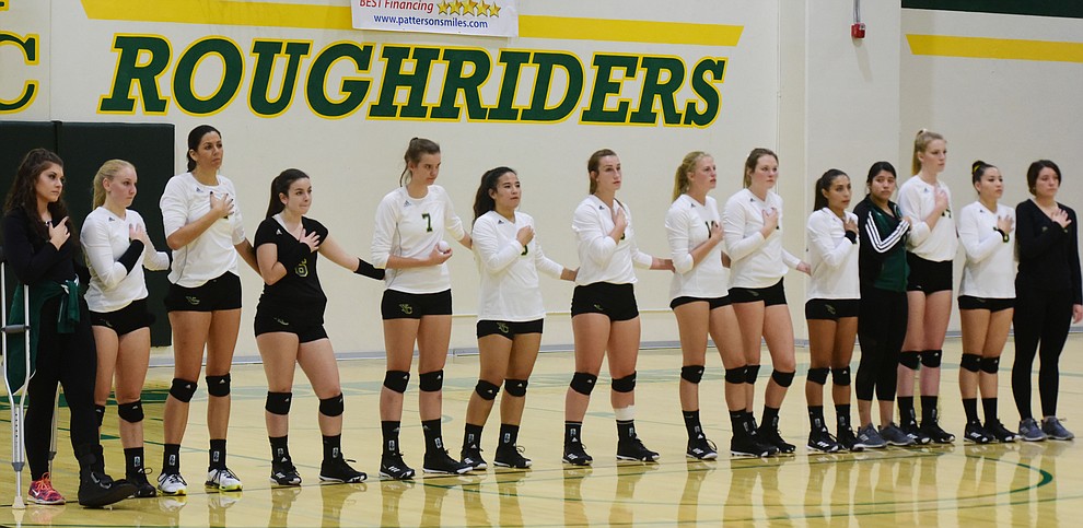 Yavapai volleyball team stands for the National Anthem as the Roughriders take on Scottsdale Community College Wednesday, September 27 in Prescott. (Les Stukenberg/Courier)