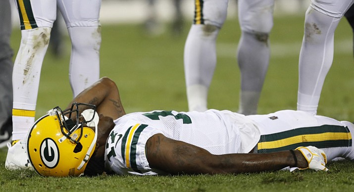 Green Bay Packers’ Davante Adams lays on the field after being hit in the head during the second half against the Chicago Bears on Thursday, Sept. 28, 2017, in Green Bay, Wis. (Matt Ludtke/AP)
