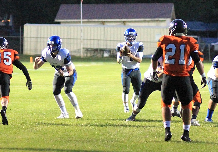 Bagdad quarterback Israel Loveall looks to pass against Williams Sept. 1. Lovell broke the national 8-man football record for career passes Sept. 22. 